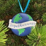 Earth Christmas Ornament with a banner across it with "togetherness" embroidered on in it.