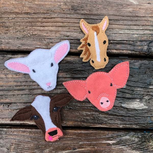 Set of four felties, sheep head, horse head, cow head and pig head by snugglepuppyapplique.com
