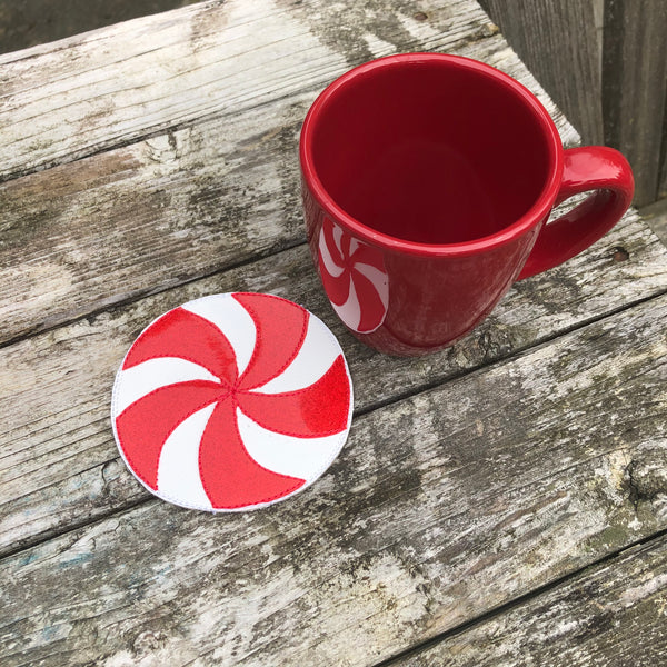 A coaster that looks like a peppermint candy. by snugglepuppyapplique.com