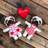 In the hoop Pug stuffie with boy and girls clothes for Valentine's day by snugglepuppyapplique.com