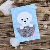 An applique of a puppy dog in a wash basin with soap and bubbles by snugglepuppyapplique.com
