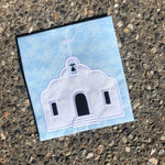 An applique of an adobe Mission by snugglepuppyapplique.com