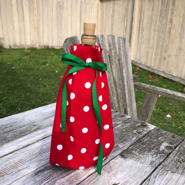 a cloth bag cinched around a bottle of whine by snugglepuppyapplique.com