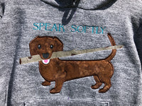 dachshund with a stick in this mouth appliqué embroidery design, snugglepuppyapplique.com