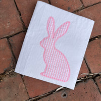 An applique of a bunny with a motif outline by snuggle puppyappllique.com