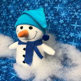 In the hoop snowman stuffy with stuffed carrot nose, hat with pompom and scarf by snugglepuppyapplique.com