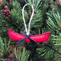 In the hoop Canoe Christmas ornament embroidery design, snugglepuppyapplique.com
