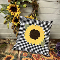an applique of a sunflower with a zig-zag applique stitch by snugglepuppyapplique.com
