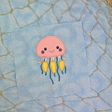 An applique of a babyish looking Jellyfish by snugglepuppyapplique.com