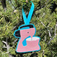 An in the hoop ornament of a 1950's style kitchen stand mixer. Make with vinyl or felt by snugglepuppyapplique.com