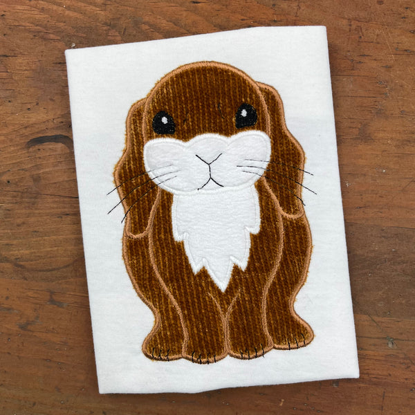 An applique of a lop eared rabbit in 6 sizes by snugglepuppyapplique.com