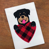 A Valentine Applique design of a Rottweiler with his paws on a heart.  Easy to personalize. by snugglepuppyappliquie.com
