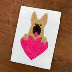 A Valentine applique design of a German Shepherd with its paws on a heart to personalize.  By snugglepuppyapplique.com