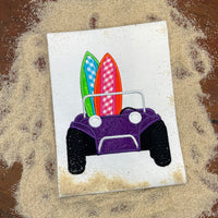 An applique of a dune buggy carrying two surfboards by snugglepuppyapplique.com