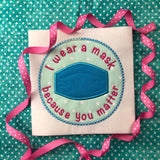 "I wear a mask because you matter" surgical mask applique embroidery Design by snugglepuppyapplique.com