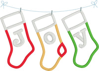 An applique of three stockings hanging on a line with "J O Y" embroidered one letter on each stocking by snugglepuppyapplique.com