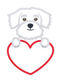 A valentine applique of a Maltese dog with its paws on a heart shape by snugglepuppyapplique.com