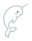 An applique of a narwhale baby by snugglepuppyapplique.com