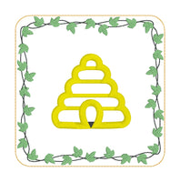 An in the hoop summer coaster of a bee hive with an ivy boarder by snugglepuppyapplique.com