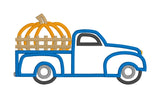 An applique of a old pick up truck with a giant pumpkin in the truck bed by snugglepuppyapplique.com