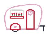 An applique of a camper with window box, heart flowers and heart on door and wheel for St. Valentine's day by snugglepuppyapplique.com
