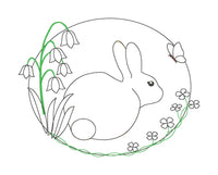 a bean stitch applique of a wild rabbit surrounded by flowers and a butterfly by snugglepuppyapplique.com