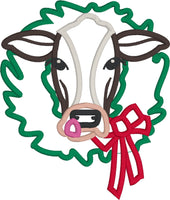Cow with a wreath Christmas Applique Embroidery Design by snugglepuppyapplique.com