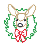 An applique of a Mule Deer with her head through a Christmas Wreath by snugglepuppyapplique.com