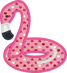 An applique of a flamingo pool floaty by snugglepuppyapplique.com