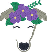 An appliuqe of an abstract Greyhound's face wearing a crown of flowers and leaves by snugglepuppyapplique.com