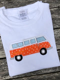 An applique of a bus with a side door that slides open on grosgrain ribbon to reveal an embroidered Labrador by snugglepuppyapplique.com