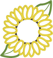 An applique design of a sunflower with two leaves by snugglepuppyapplique.com